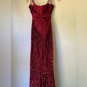 Hello I am selling this Cinderella Divine dress! It is in perfect condition!